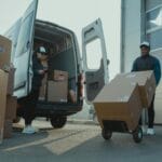 A Man and a Woman Working for a Delivery Company
